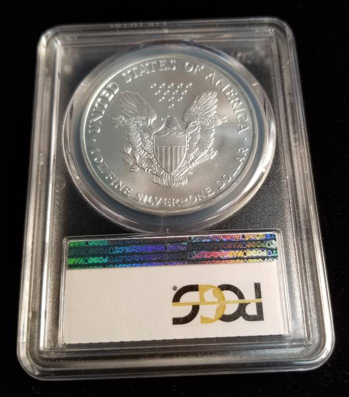 lot 17 image: 2001 AMERICAN SILVER EAGLE 1 TROY OZ. .999 FINE SILVER MS69 PCGS