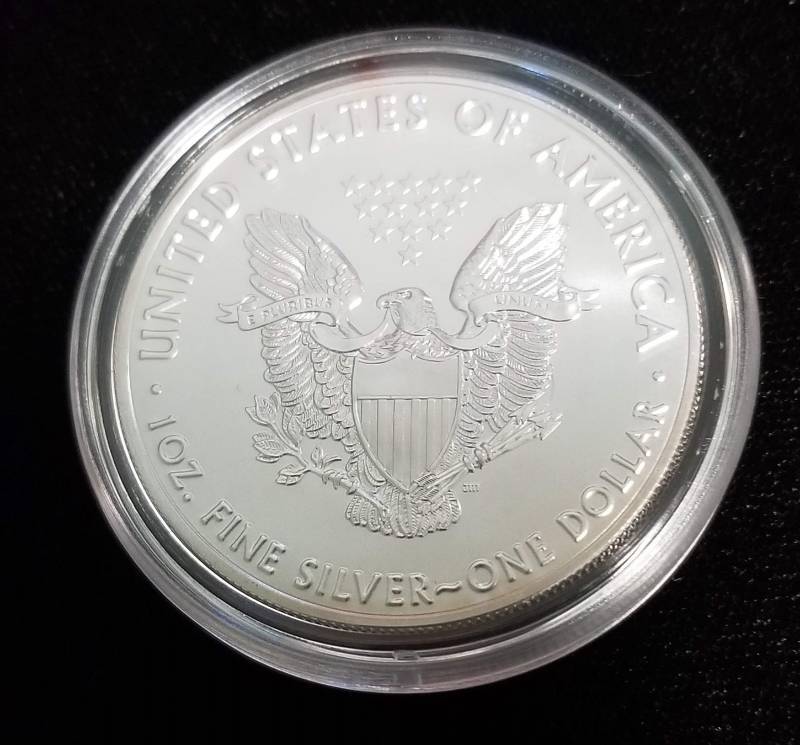 lot 23 image: 2016 AMERICAN SILVER EAGLE 1 TROY OZ. .999 FINE SILVER IN AIRTITE