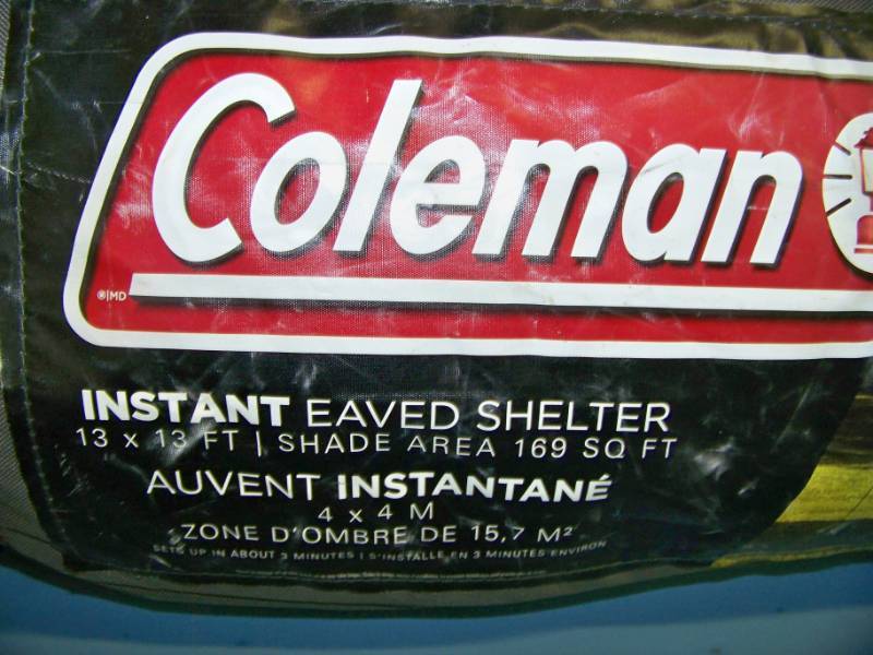 lot 44 image: Coleman Instant Eaved Shelter in Carrying Bag with Wheels