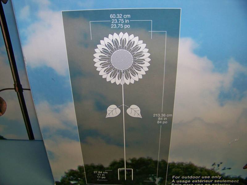 lot 24 image: (2) Southern Patio, Sunflower Wind Spinners in Original Boxes