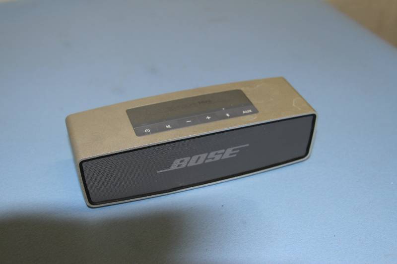 lot 73 image: Bose SoundLink Mini Portable Bluetooth Audio SystemSpeaker with Base & Charger