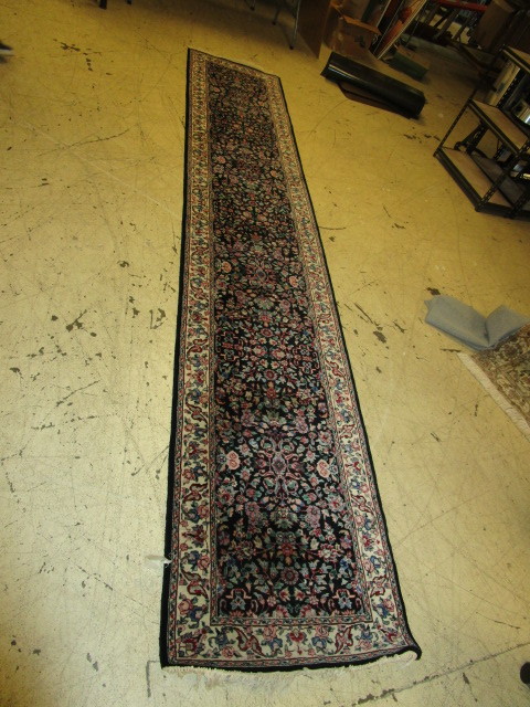 lot 615 image: DAYTONS HOME STORE ORIENTAL RUNNER RUG