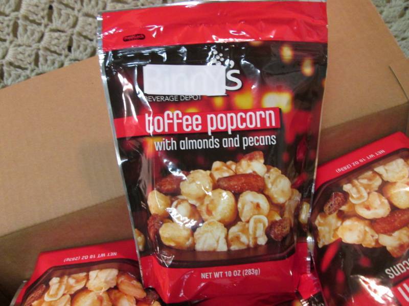 lot 43 image: Case of 12 Bags of Toffee Popcorn w...