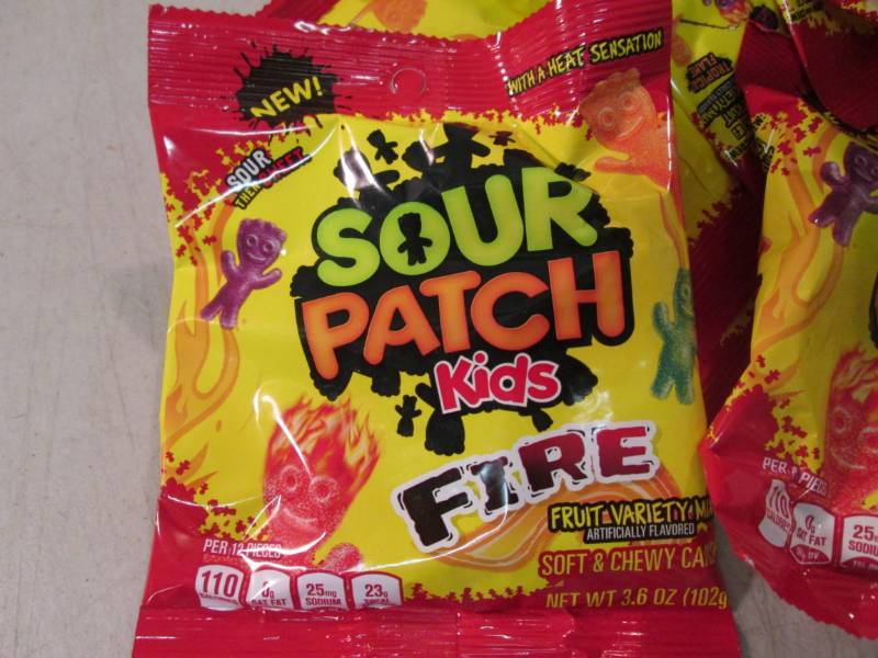 lot 94 image: Case of 12 Bags of Sour Patch Fire ...