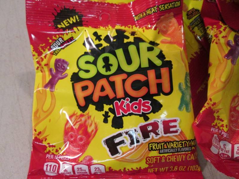 lot 95 image: Case of 12 Bags of Sour Patch Fire ...