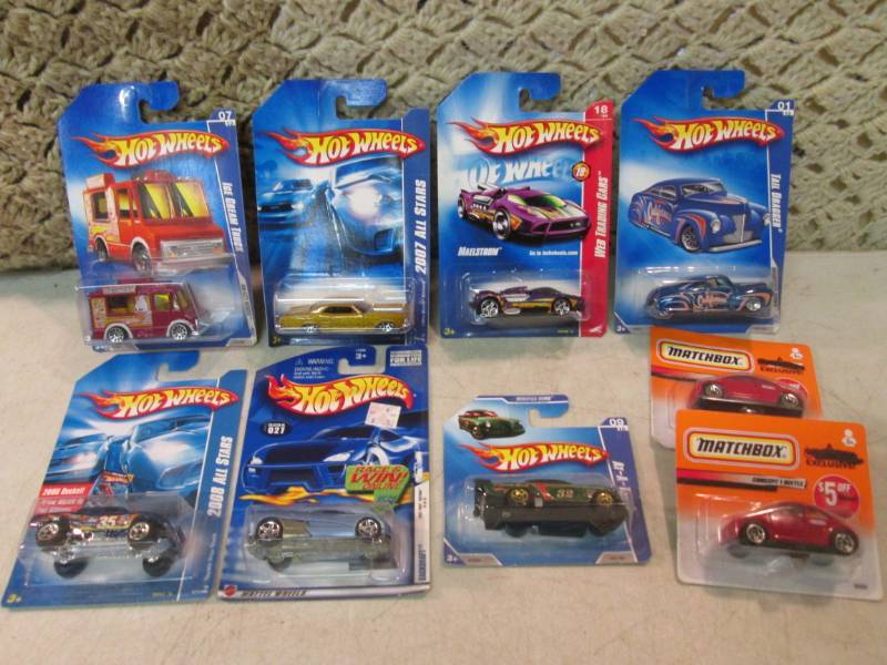 lot 104 image: Lot of Hot Wheels and Matchbox Cars...