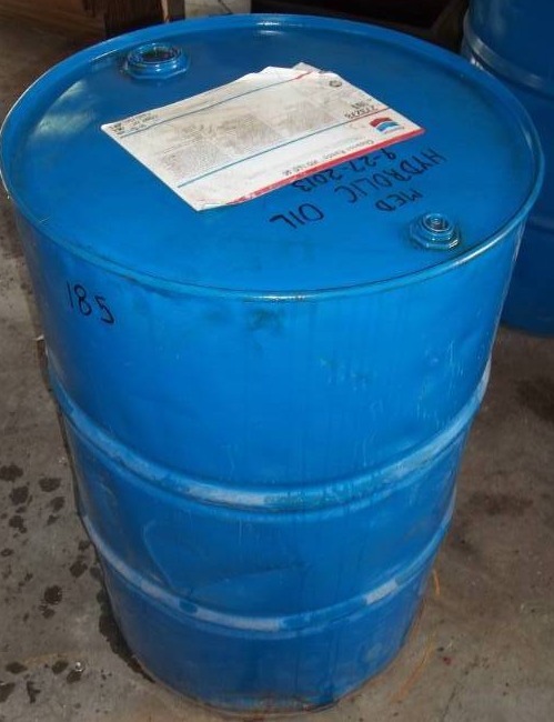 lot 185 image: Hydraulic Oil and Barrel