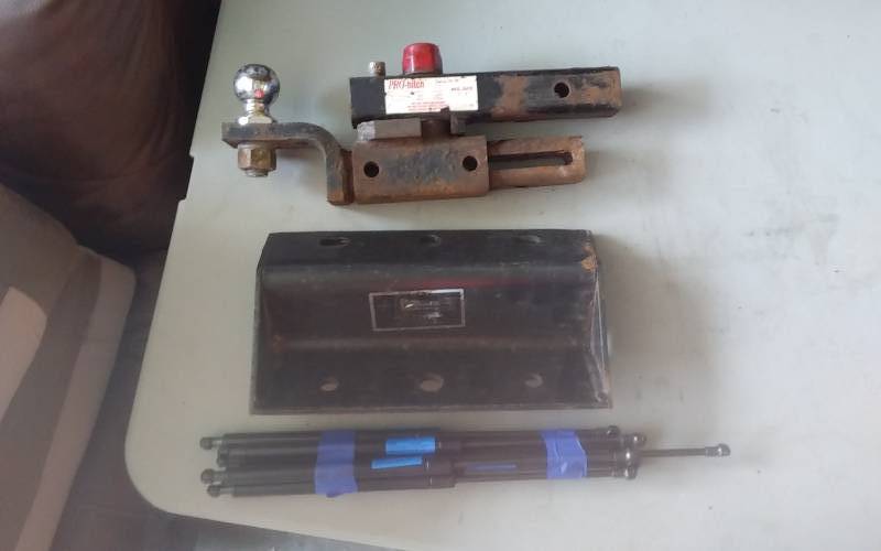 lot 22 image: Hitch Parts & Hood Struts