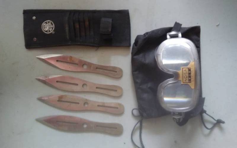 lot 28 image: 4-Smith & Wesson Throwing Knives, Pair Of Fatal Vision Drunk Goggles