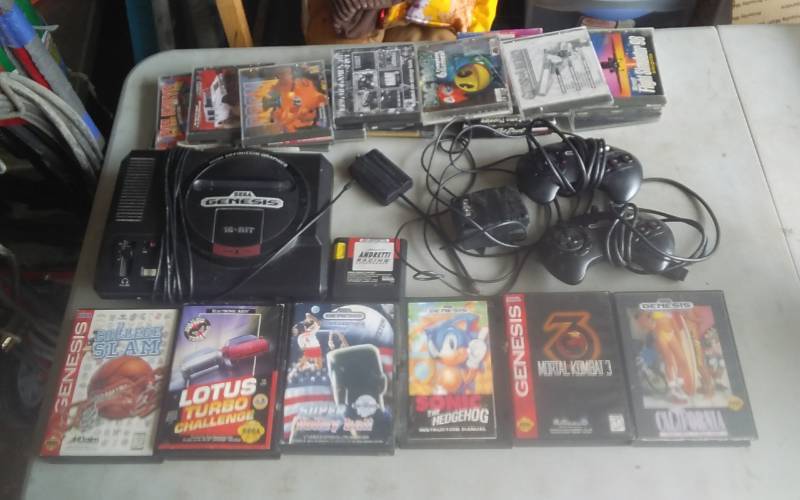 lot 49 image: Sega Genesis, 2-Remotes, 7-Games, Other PC Games