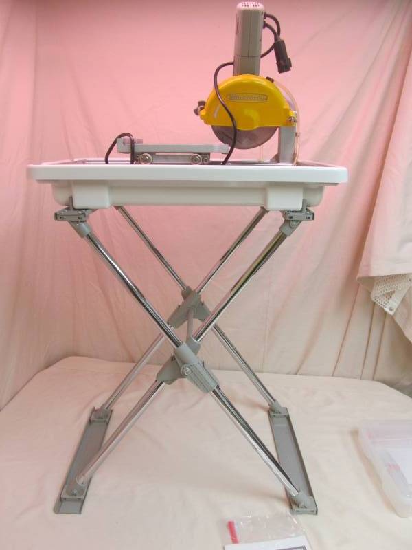 lot 34 image: Work Force Tile stone stand ,saw