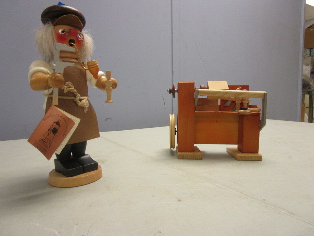 lot 309 image: CHRISTIAN ULBRICHT WOODWORKER SMOKER WITH STEINBACH LATHE MUSIC BOX
