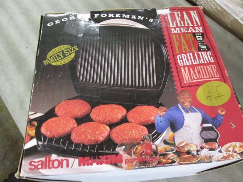 lot 29 image: George Foreman Grilling Machine...