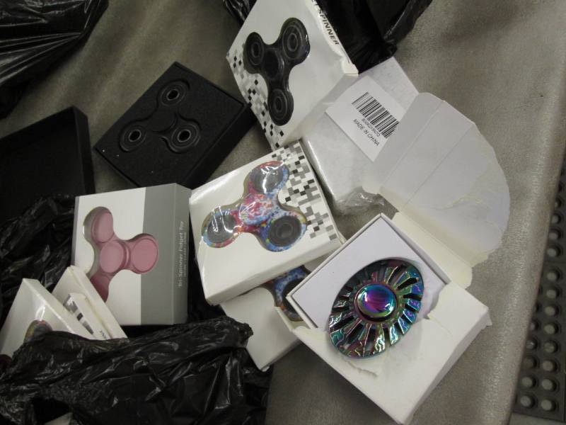lot 129 image: 24 Assorted Fidget Spinners...