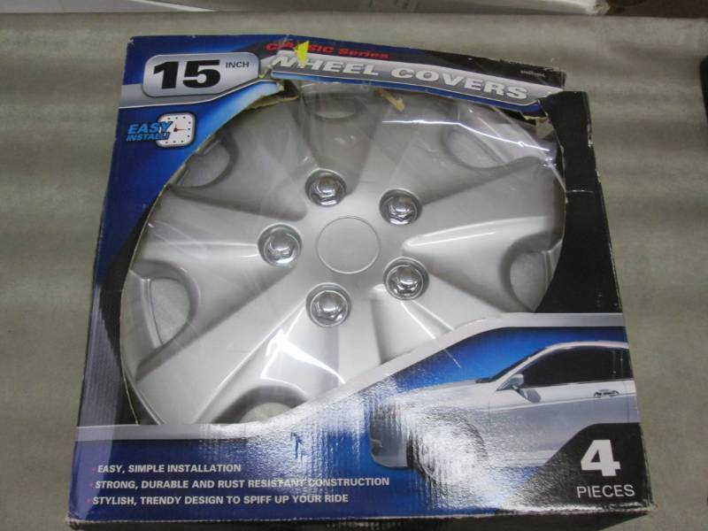 lot 235 image: 15 inch Wheel Covers Set of 4...
