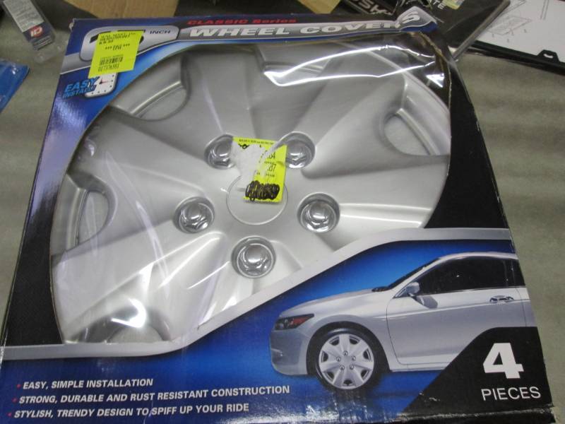 lot 248 image: 15 inch Wheel Covers Set of 4...