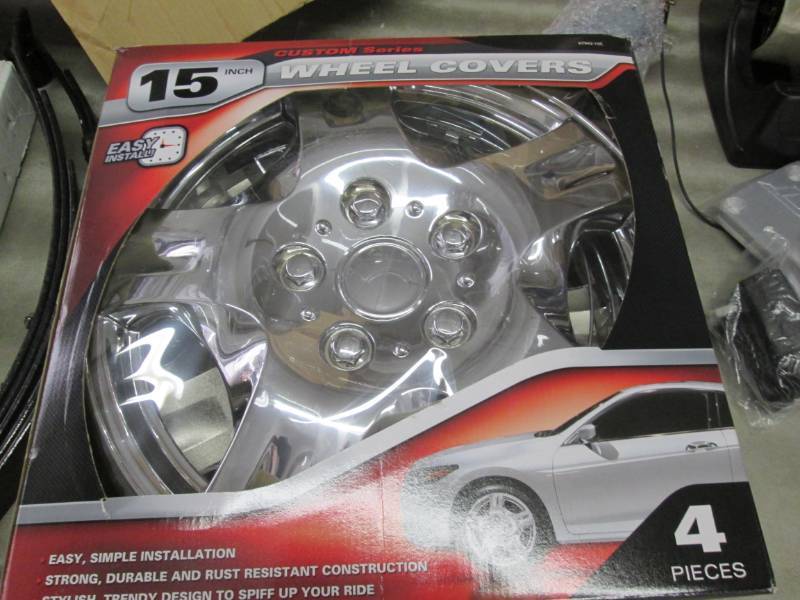 lot 260 image: 15 inch Wheel Covers Set of 4...