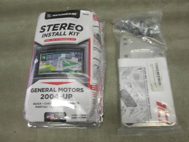 lot 275 image: Stereo Install Kit, Engine Swap Bra...