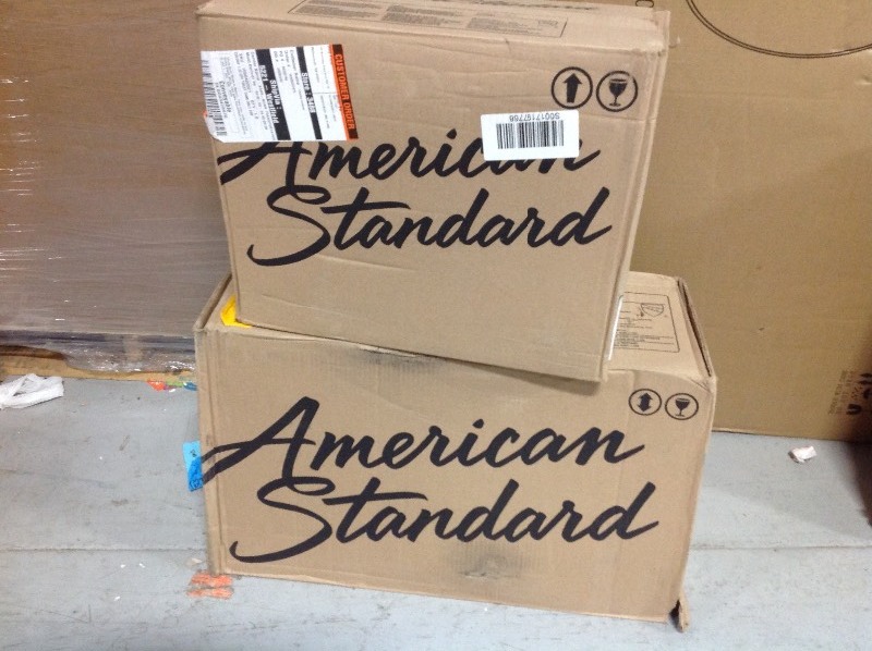 lot 103 image: American Standard Colony 2-Piece 1.28 GPF Single Flush Round Toilet in White, Seat Not Included not used