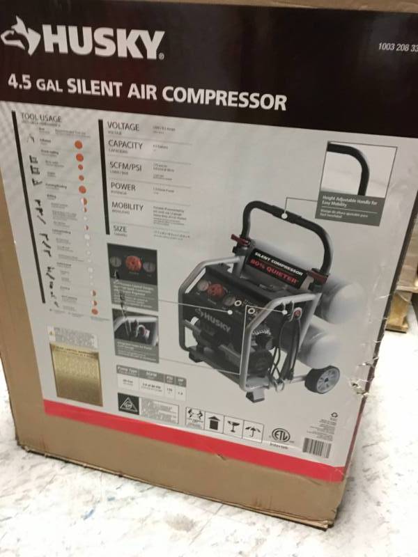 Husky 4.5 Gal. Portable Electric-Powered Silent Air Compressor  in good condition