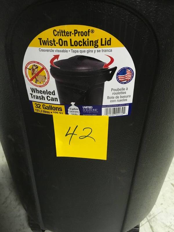 lot 42 image: United Solutions 32 Gal. Wheeled Blow Molded Outdoor Trash Can in Black  in good condition