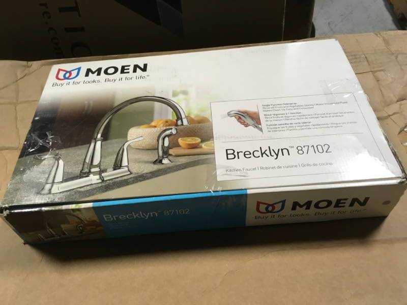 lot 66 image: MOEN Brecklyn 2-Handle Standard Kitchen Faucet with Side Sprayer in Chrome in good condition