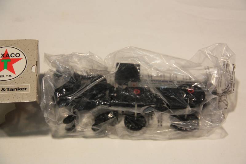 lot 90 image: Texaco Horse and Tanker Die Cast Bank