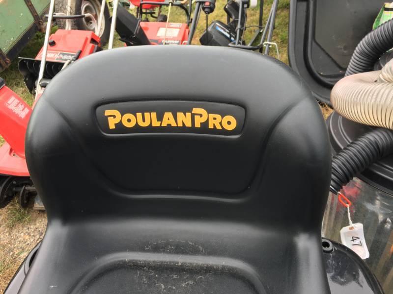 lot 38 image: Poulan Pro Riding Lawn Mower, 48inch  -- NEW - ONLY HAS 19 HOURS ON IT - WITH A 2 YEAR WARRANTY STILL ON IT