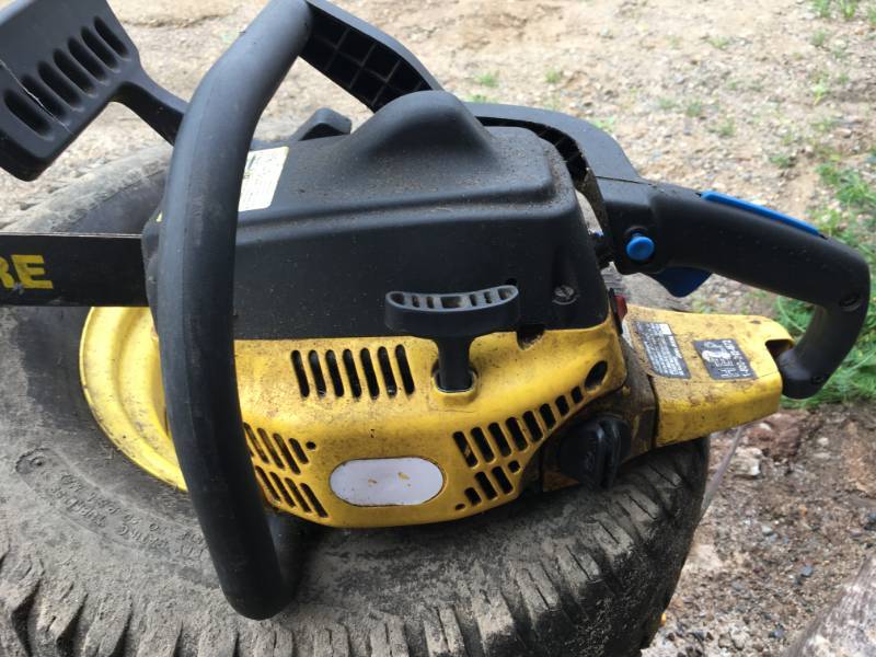 lot 143 image: John Deere Chain Saw