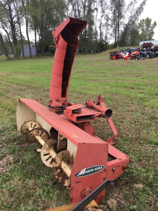 lot 324 image: New Idea 7ft Snow Plow Attachment - WITH PRO SHAFT -  VERY NICE CONDITION - AND ALSO HAS HYDRAULIC SHOOT