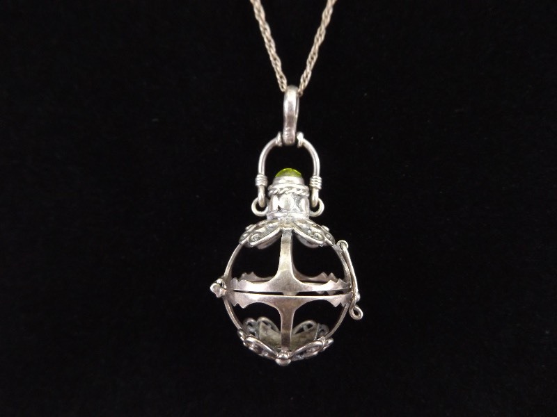 lot 21 image: .925 Sterling Silver Antique Open Locket Peridot Cabochon Pendant Necklace