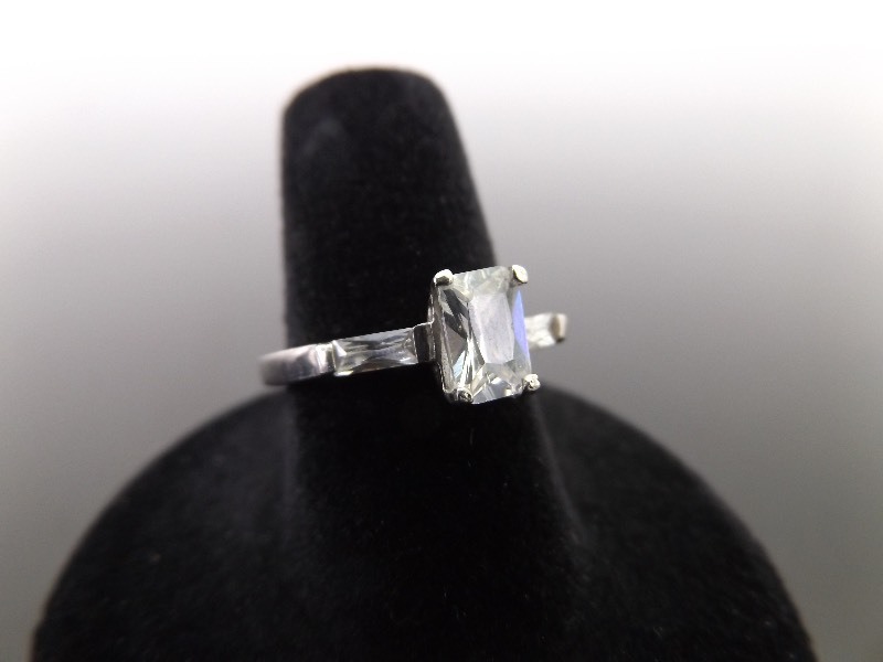 lot 46 image: .925 Sterling Silver Emerald Cut Crystal Ring Size 6.75
