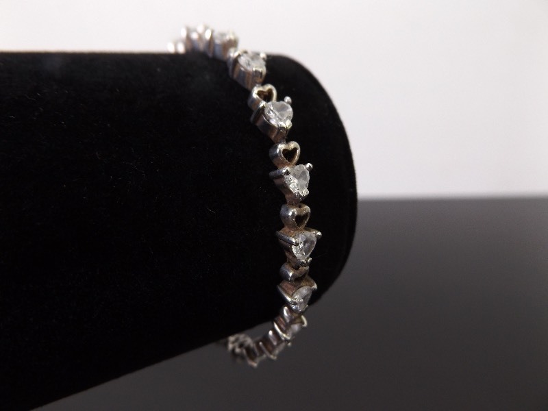lot 59 image: .925 Sterling Silver Crystal Heart Tennis Bracelet
