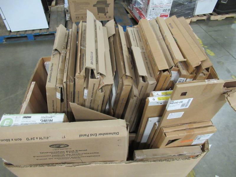 lot 101 image: MIXED WHOLESALE PALLET OF MISCELLANEOUS BUILDING MATERIALS FROM RETAIL STORE REMODEL - DISHWASHERCABINET END PANELS AND MORE