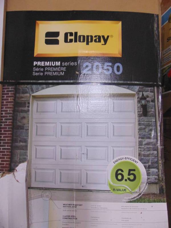 lot 400 image: Clopay Premium Series 8 ft. x 7 ft. 6.5 R-Value Insulated White Garage Door 2050