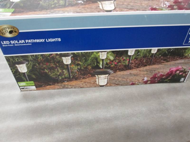 lot 1 image: Hampton Bay Solar Powered Black LED...