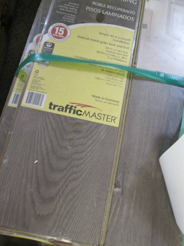 lot 294 image: 7 Cases TrafficMaster Anniston Oak ...