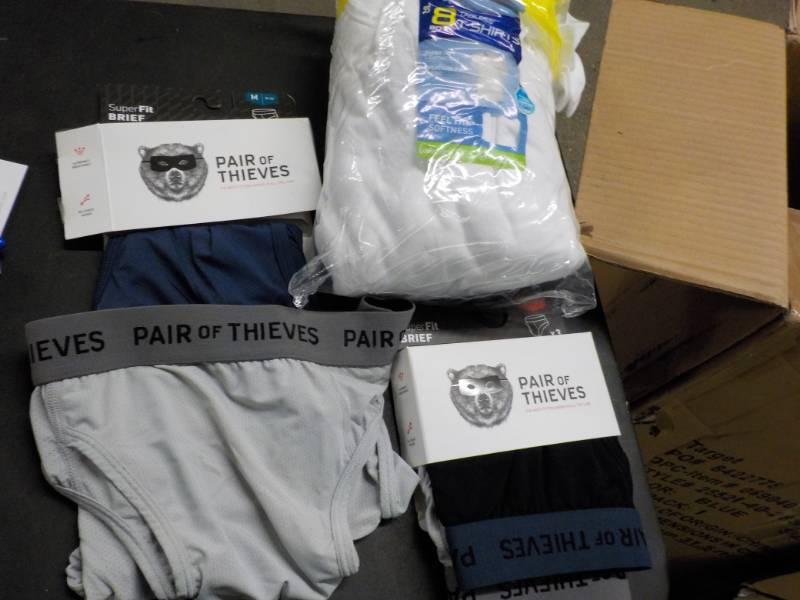 lot 78 image: 8 Boys L t-shirts and 4 pairs of th...