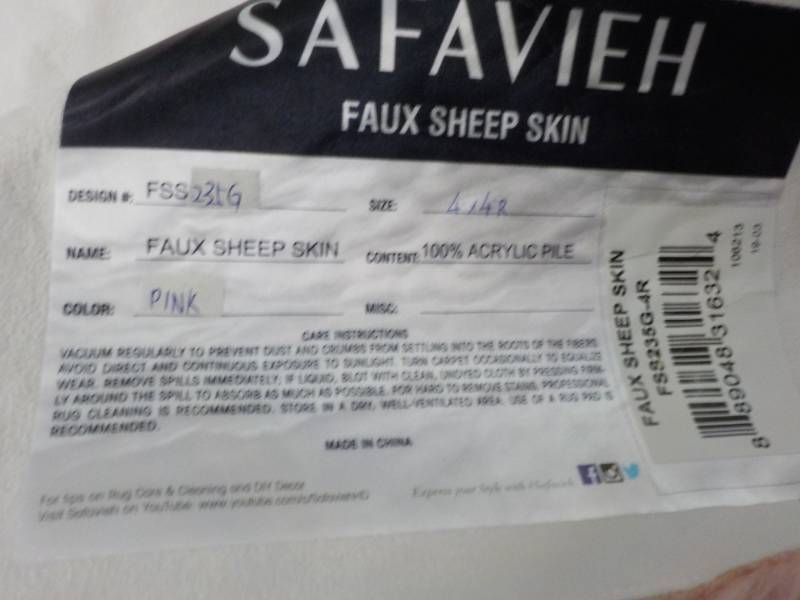 lot 95 image: Safavieh Pink Faux Sheep Skin 4 ft ...