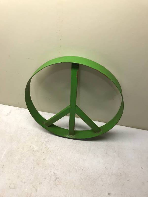lot 40 image: 16 Metal Peace Sign, Used, Some Wear