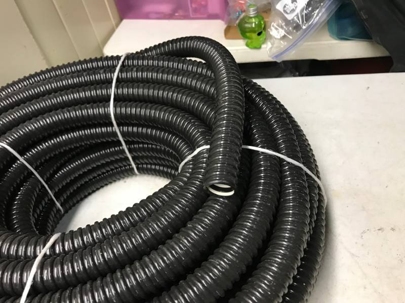 lot 61 image: Two Rolls Of Uniflex Hoses