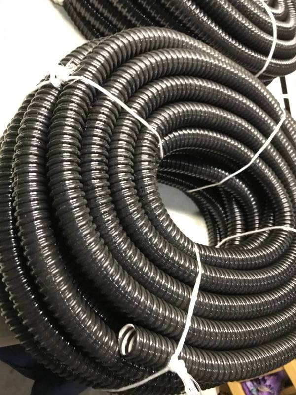 lot 66 image: Two Rolls Of Uniflex Hoses