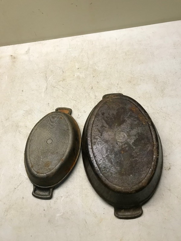 lot 91 image: Two Oval Cast Iron Pans