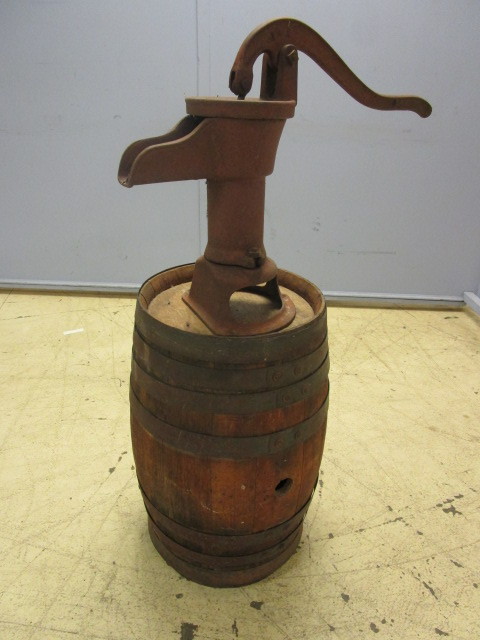 lot 131 image: OAK KEG WITH STEEL BANDING AND WELL PUMP HEAD