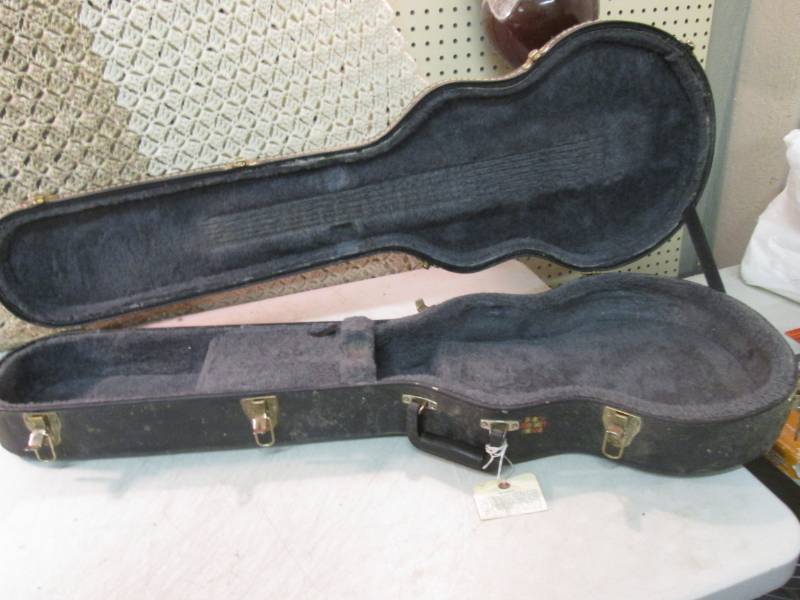 lot 61 image: Epiphone Hard Shell Electric Guitar...