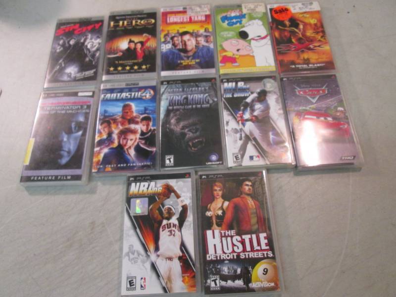 lot 66 image: Lot of 12 PSP Movies and Games  EC1...