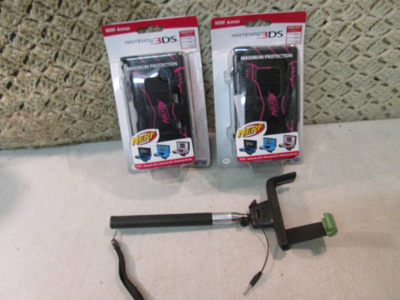 lot 81 image: 2 Nintendo 3DS Nerf Armor Cases and...