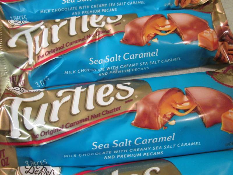 lot 130 image: 12 Turtles Candy Bars Best by Apr 2...