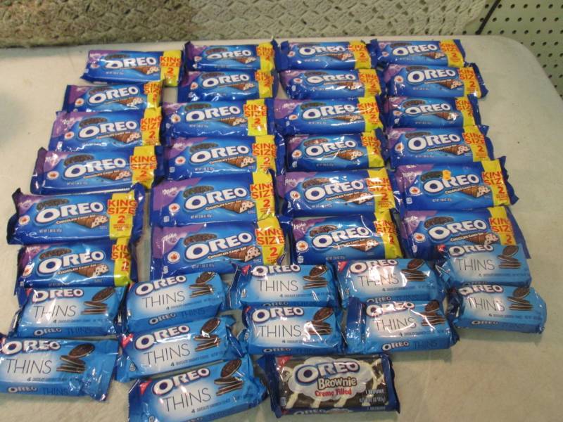 lot 136 image: Assorted Oreo Cookies and Candy Bar...