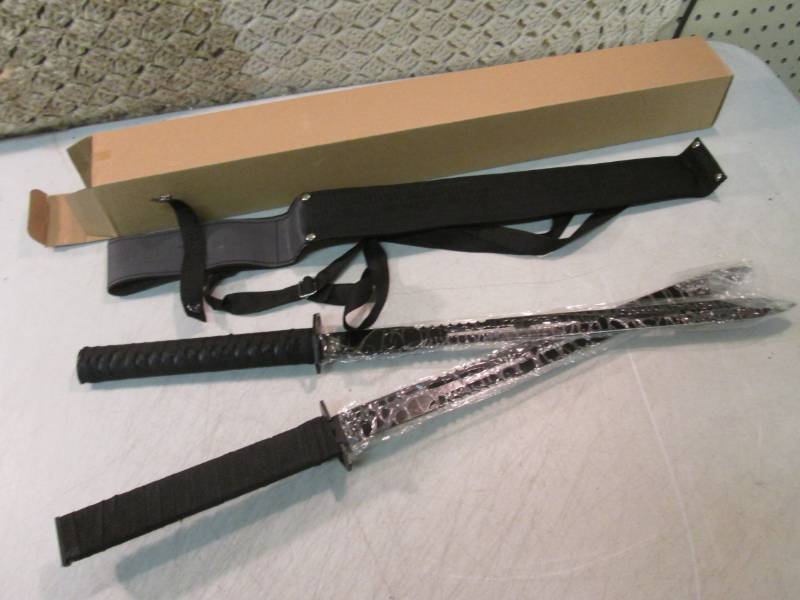 lot 175 image: Double Magnetic 24 Sword with Shea...